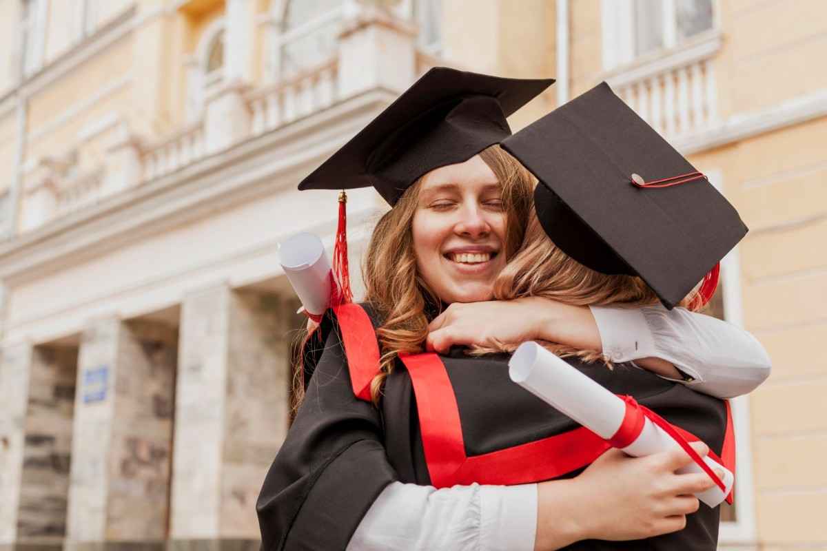 Three students celebrate convocation day